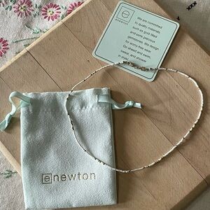 enewton choker gold, white seed beads